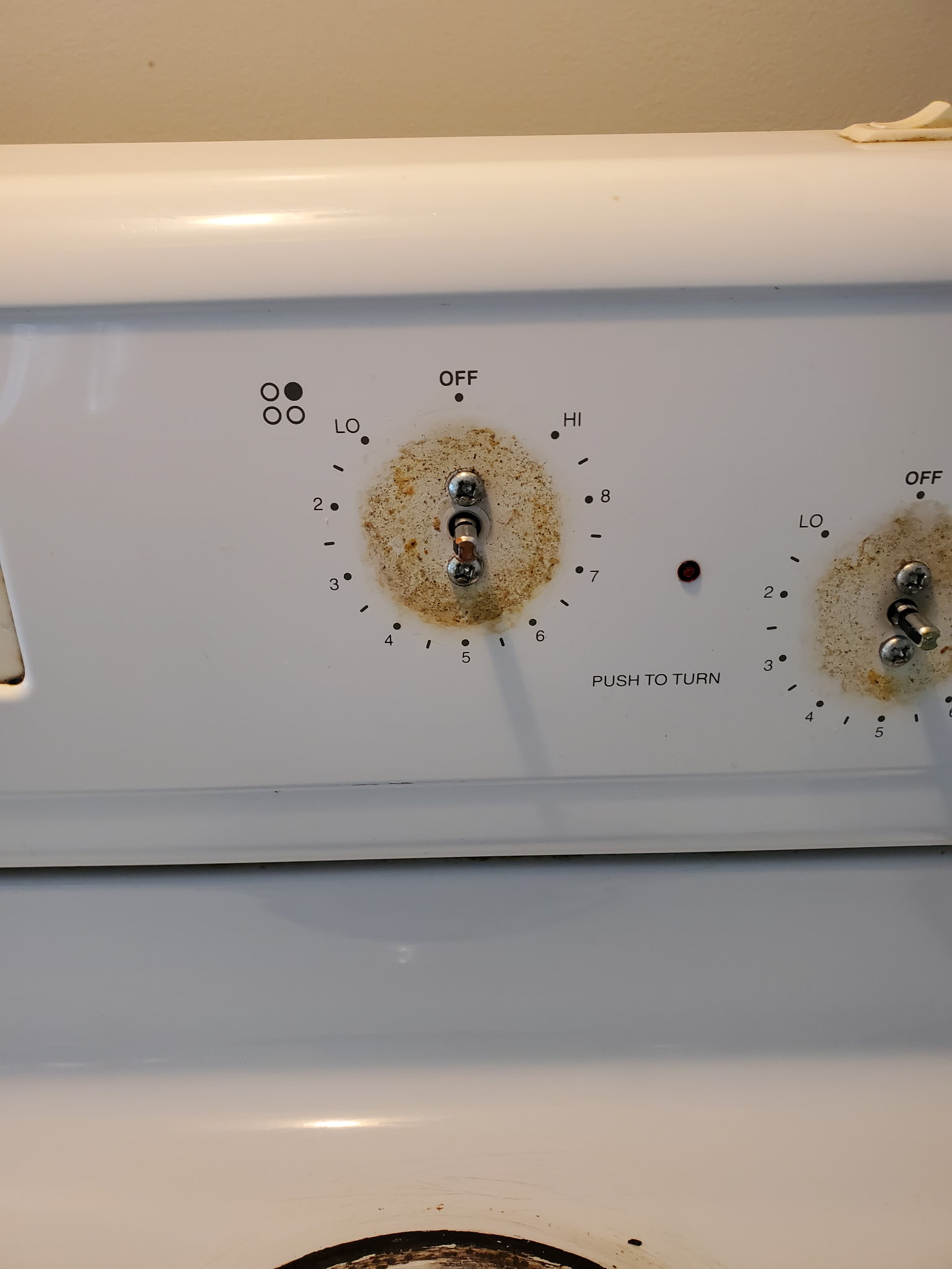 Stove control panel before kitchen detail cleaning